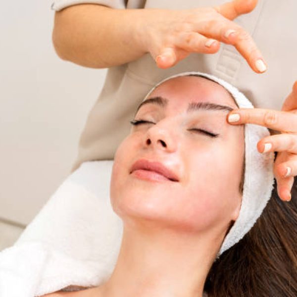 Facial massage and peeling application with special oils for the beautiful woman